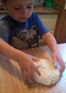 You don't need a perfectly smooth ball of dough right now. Remember that you're going to take a rolling pin to it after it chills.