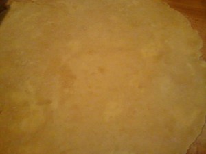 If you look closely, you can see butter smooshed into the dough--they're the lighter colored splotches. That's what you want!