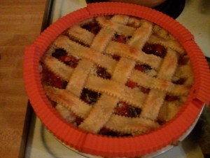 You can use silicone pie crust shields like these, or create your own by tenting foil around the edges.