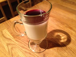 Mama topped this with some leftover pear-poaching syrup. If the panna cotta weren't properly set, the liquid would never sit on top like that.